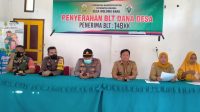 Salurkan BLT 2022 Tahap Satu, Kades Wolowa Baru Harap Masyarakat Untuk Lakukan Vaksinasi